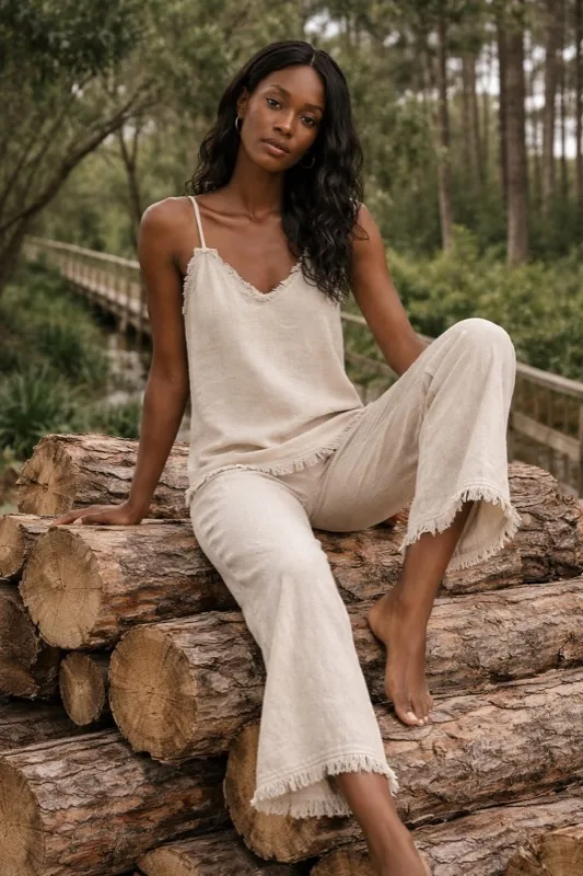 Pantaloni beige con frange