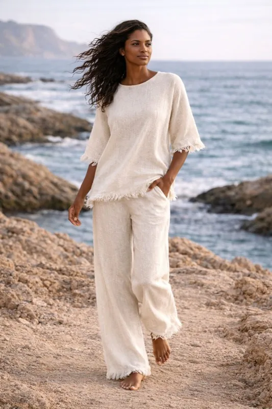 Set top e pantaloni beige con frange