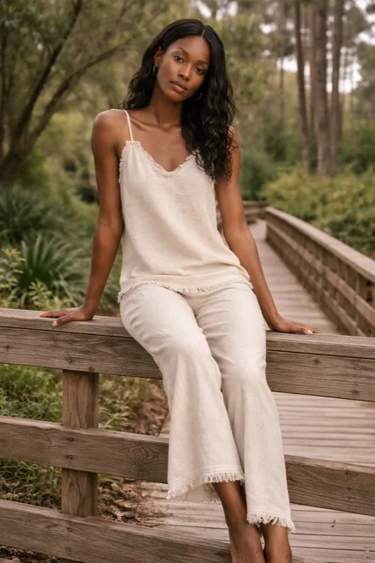 Top beige con spalline e frange